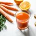 Quais são os benefícios de tomar suco de cenoura?