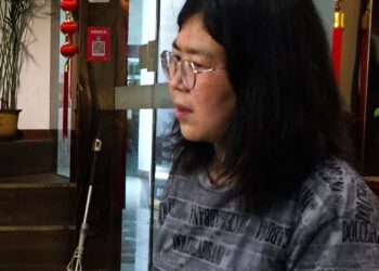 Denunciante do COVID na China é condenada a 4 anos de prisão