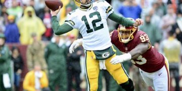 O quarterback Aaron Rodgers (à esquerda).

Foto: All-Pro Reels / Flickr